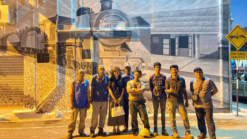 The mural under construction