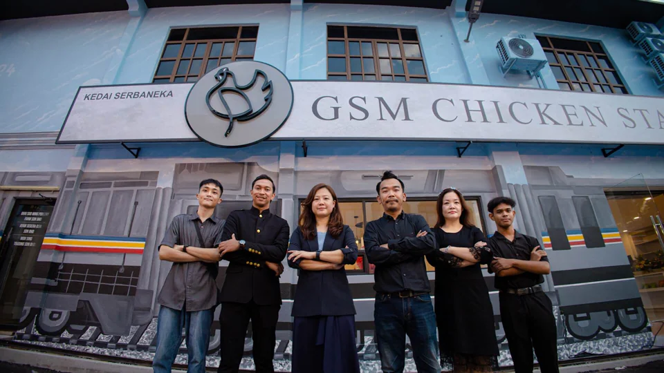 The GSM Chicken Station team in front of the store in Segamat